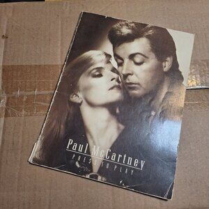 Paul McCartney press to play book